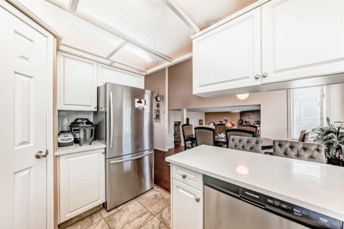 283 Macewan Drive Nw, Calgary, AB - Indoor Photo Showing Kitchen With Stainless Steel Kitchen