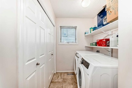 283 Macewan Drive Nw, Calgary, AB - Indoor Photo Showing Laundry Room