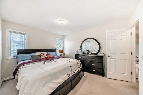 283 Macewan Drive Nw, Calgary, AB - Indoor Photo Showing Bedroom