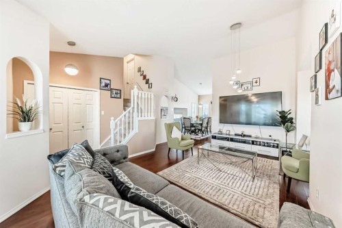 283 Macewan Drive Nw, Calgary, AB - Indoor Photo Showing Living Room