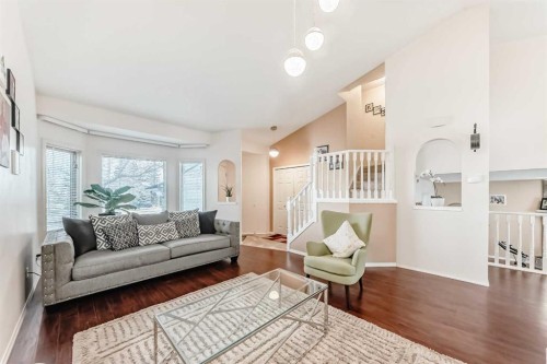 283 Macewan Drive Nw, Calgary, AB - Indoor Photo Showing Living Room