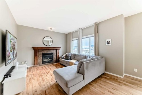 284 Sagewood Landing Sw, Airdrie, AB - Indoor Photo Showing Living Room With Fireplace