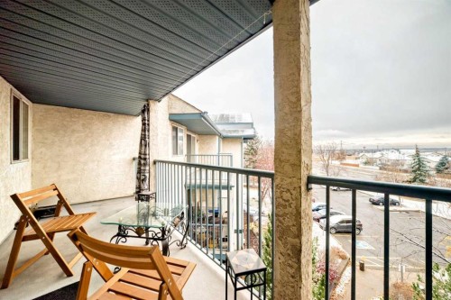 409-10 Dover Point Se, Calgary, AB - Outdoor With Balcony With Exterior