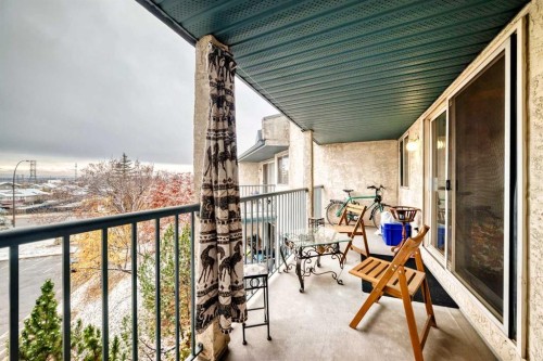 409-10 Dover Point Se, Calgary, AB - Outdoor With Balcony With Exterior