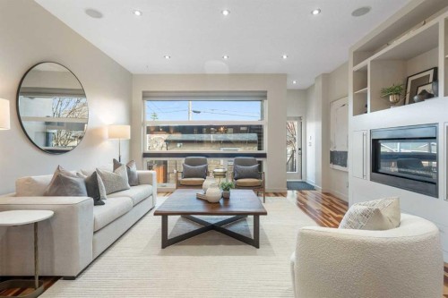218 8A Street Ne, Calgary, AB - Indoor Photo Showing Living Room With Fireplace