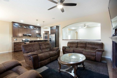 169 Taralake Manor Ne, Calgary, AB - Indoor Photo Showing Living Room With Fireplace