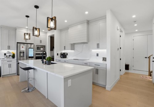 49 Waterford Crescent, Chestermere, AB - Indoor Photo Showing Kitchen With Upgraded Kitchen