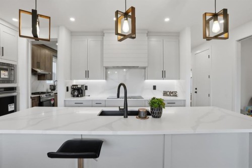 49 Waterford Crescent, Chestermere, AB - Indoor Photo Showing Kitchen With Upgraded Kitchen