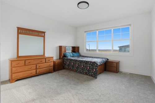 49 Waterford Crescent, Chestermere, AB - Indoor Photo Showing Bedroom