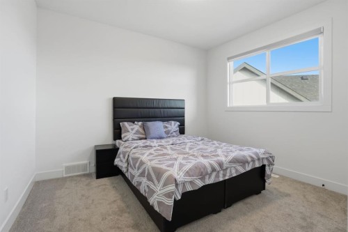 49 Waterford Crescent, Chestermere, AB - Indoor Photo Showing Bedroom