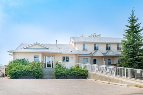 13-204 Strathaven Drive, Strathmore, AB - Outdoor With Facade