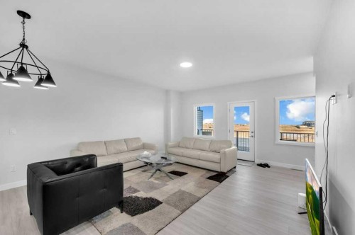 214 Corner Meadows Square, Calgary, AB - Indoor Photo Showing Living Room