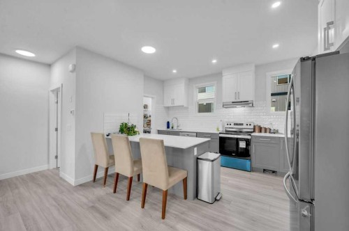 214 Corner Meadows Square, Calgary, AB - Indoor Photo Showing Kitchen With Stainless Steel Kitchen With Upgraded Kitchen
