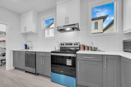 214 Corner Meadows Square, Calgary, AB - Indoor Photo Showing Kitchen With Upgraded Kitchen