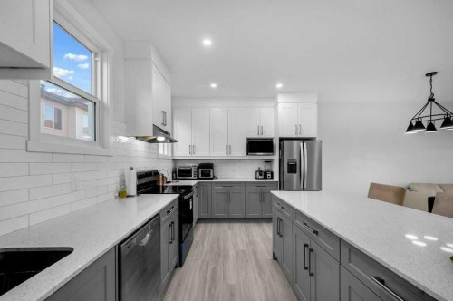 214 Corner Meadows Square, Calgary, AB - Indoor Photo Showing Kitchen With Stainless Steel Kitchen With Upgraded Kitchen