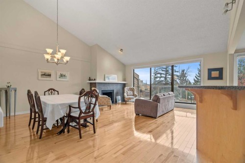 6-1220 Prominence Way Sw, Calgary, AB - Indoor With Fireplace
