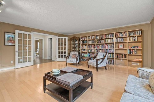 6-1220 Prominence Way Sw, Calgary, AB - Indoor Photo Showing Living Room