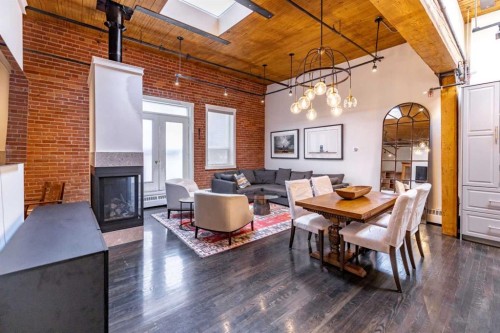 505-535 10 Avenue Sw, Calgary, AB - Indoor Photo Showing Dining Room With Fireplace