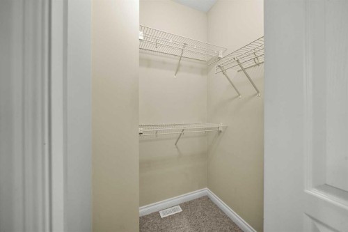 116 Tucker Circle, Okotoks, AB - Indoor With Storage