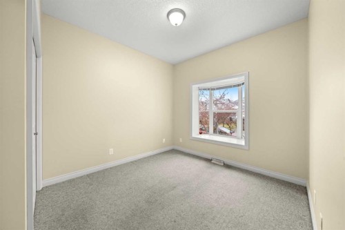 116 Tucker Circle, Okotoks, AB - Indoor Photo Showing Other Room