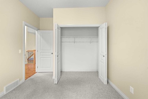 116 Tucker Circle, Okotoks, AB - Indoor Photo Showing Other Room