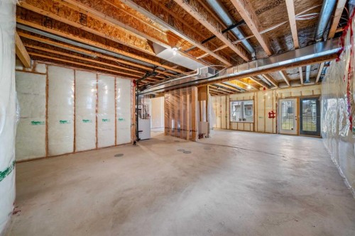 116 Tucker Circle, Okotoks, AB - Indoor Photo Showing Basement