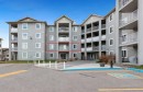 1212-604 8 Street Sw, Airdrie, AB  - Outdoor With Balcony With Facade 