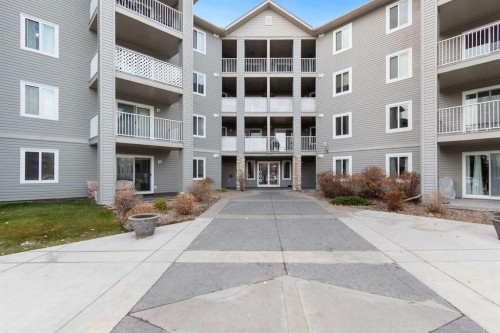 1212-604 8 Street Sw, Airdrie, AB - Outdoor With Balcony With Facade