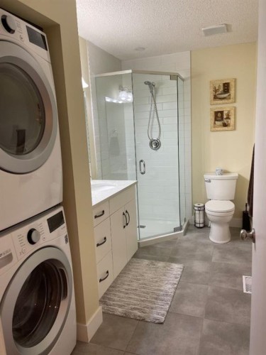2 Richelieu Court Sw, Calgary, AB - Indoor Photo Showing Laundry Room