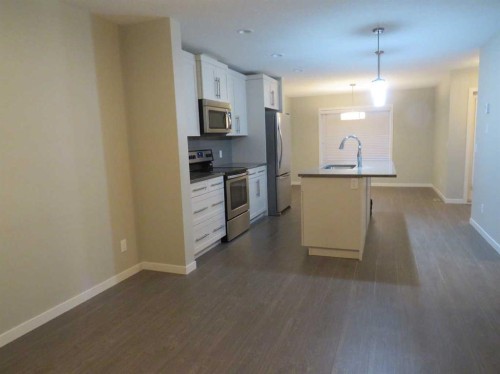 309 Evansridge Park Nw, Calgary, AB - Indoor Photo Showing Kitchen With Stainless Steel Kitchen