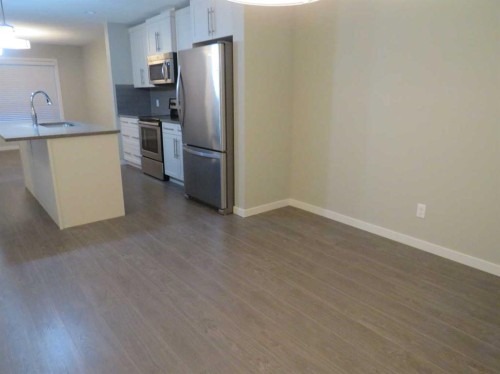 309 Evansridge Park Nw, Calgary, AB - Indoor Photo Showing Kitchen With Stainless Steel Kitchen