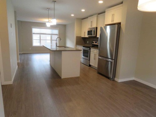 309 Evansridge Park Nw, Calgary, AB - Indoor Photo Showing Kitchen With Stainless Steel Kitchen