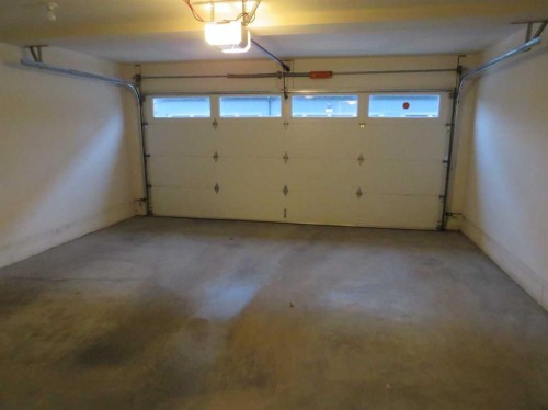 309 Evansridge Park Nw, Calgary, AB - Indoor Photo Showing Garage
