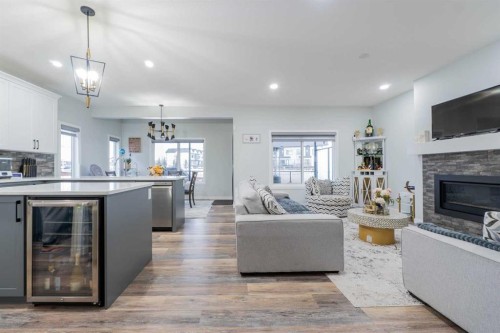 1153 Chinook Gate Bay Sw, Airdrie, AB - Indoor Photo Showing Living Room With Fireplace