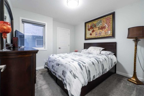1153 Chinook Gate Bay Sw, Airdrie, AB - Indoor Photo Showing Bedroom