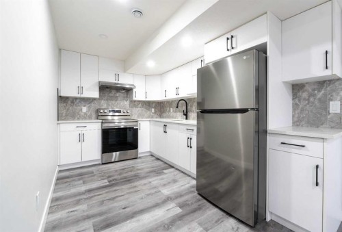 1153 Chinook Gate Bay Sw, Airdrie, AB - Indoor Photo Showing Kitchen With Stainless Steel Kitchen