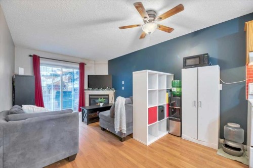 411-103 Strathaven Drive, Strathmore, AB - Indoor With Fireplace