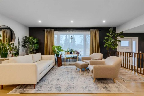 732 Lake Ontario Drive Se, Calgary, AB - Indoor Photo Showing Living Room