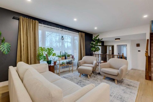 732 Lake Ontario Drive Se, Calgary, AB - Indoor Photo Showing Living Room