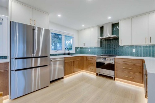 732 Lake Ontario Drive Se, Calgary, AB - Indoor Photo Showing Kitchen With Upgraded Kitchen