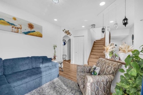 300 Taracove Estate Drive Ne, Calgary, AB - Indoor Photo Showing Living Room