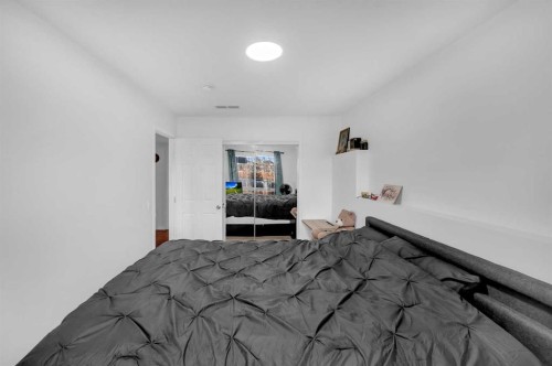 300 Taracove Estate Drive Ne, Calgary, AB - Indoor Photo Showing Bedroom