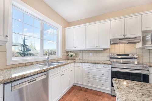 10 Tusslewood Heights Nw, Calgary, AB - Indoor Photo Showing Kitchen With Double Sink