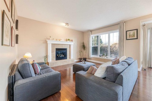 10 Tusslewood Heights Nw, Calgary, AB - Indoor Photo Showing Living Room With Fireplace