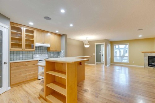 826 18 Avenue Nw, Calgary, AB - Indoor Photo Showing Other Room With Fireplace