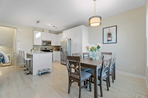 1191 Channelside Drive Sw, Airdrie, AB - Indoor Photo Showing Dining Room