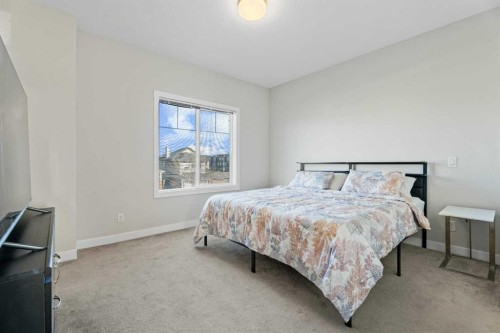 1191 Channelside Drive Sw, Airdrie, AB - Indoor Photo Showing Bedroom