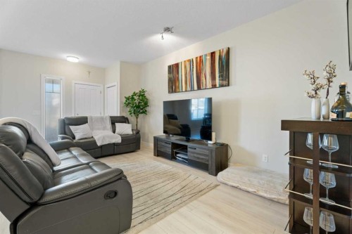1191 Channelside Drive Sw, Airdrie, AB - Indoor Photo Showing Living Room