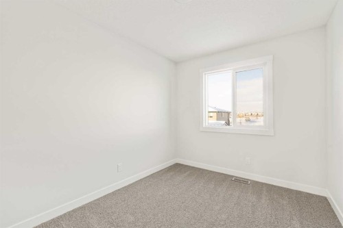 62 Setonvista Grove Se, Calgary, AB - Indoor Photo Showing Other Room