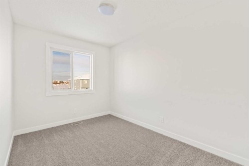 62 Setonvista Grove Se, Calgary, AB - Indoor Photo Showing Other Room
